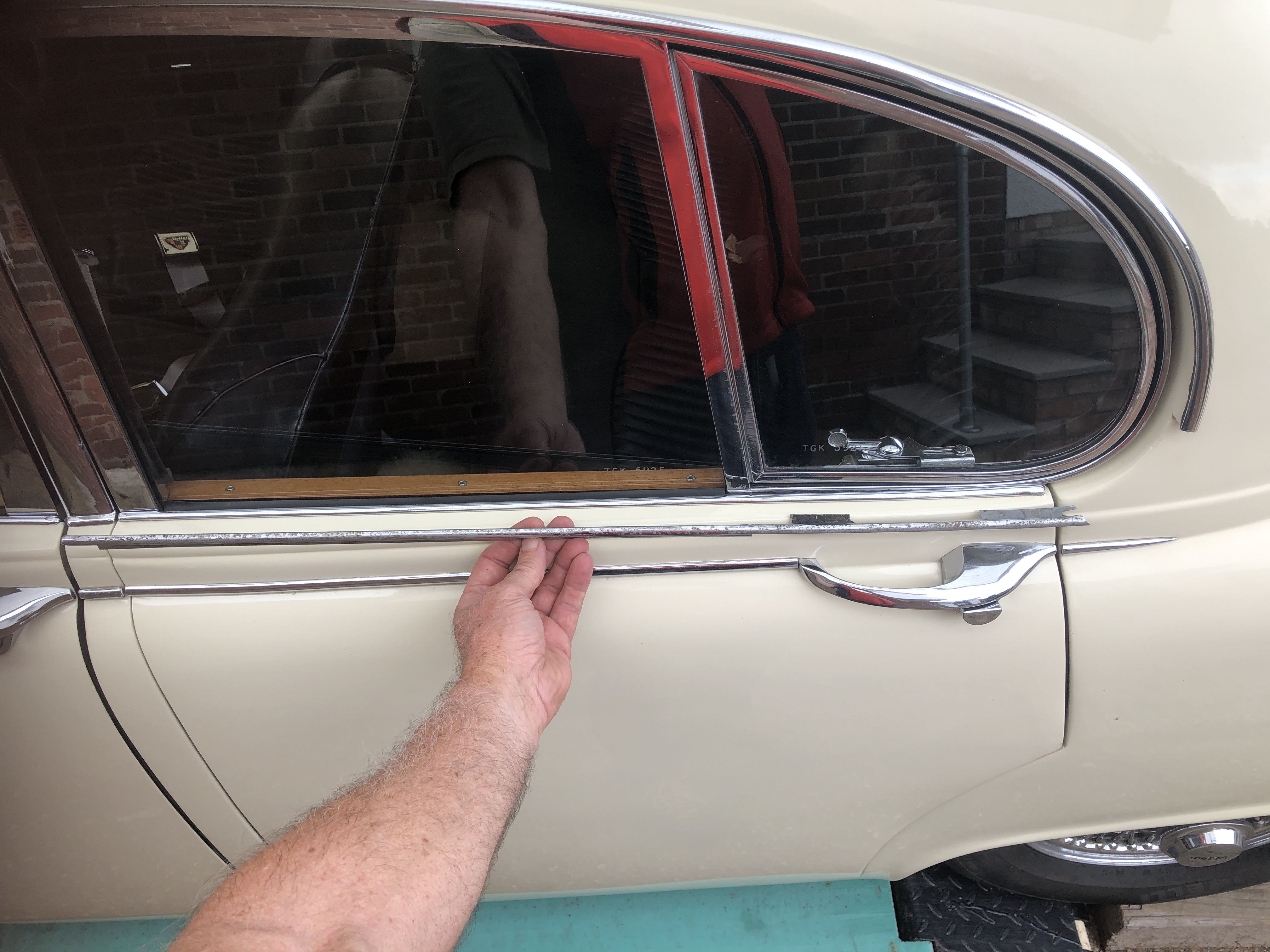 door chrome strip being offered up.